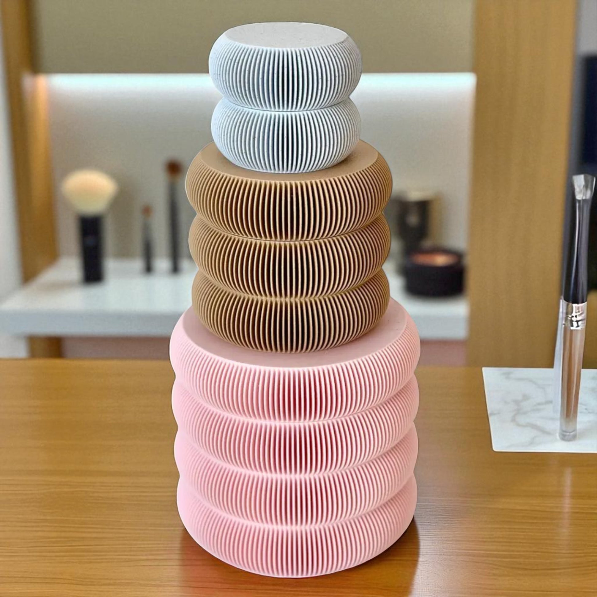 Set of elegant vanity jars in three different sizes, perfect for organizing cosmetics or accessories; available for purchase individually or as a complete set to enhance any bathroom or dressing table decor.