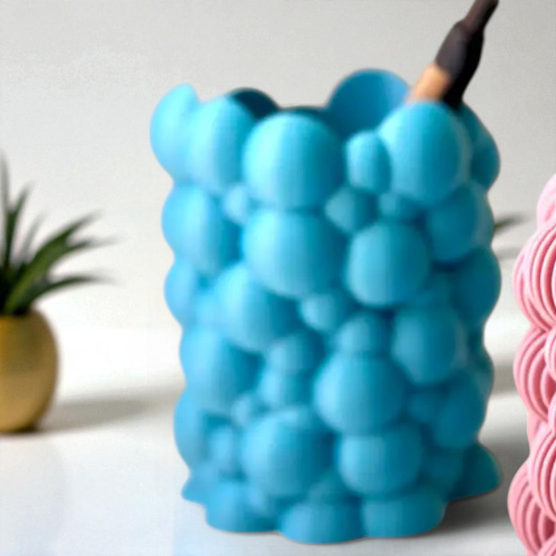 Bubbley Solid and Bubbley Lamel holders, versatile and stylish makeup brush or pen organizers with a playful bubble design, ideal for adding charm to office desks or vanity setups.
