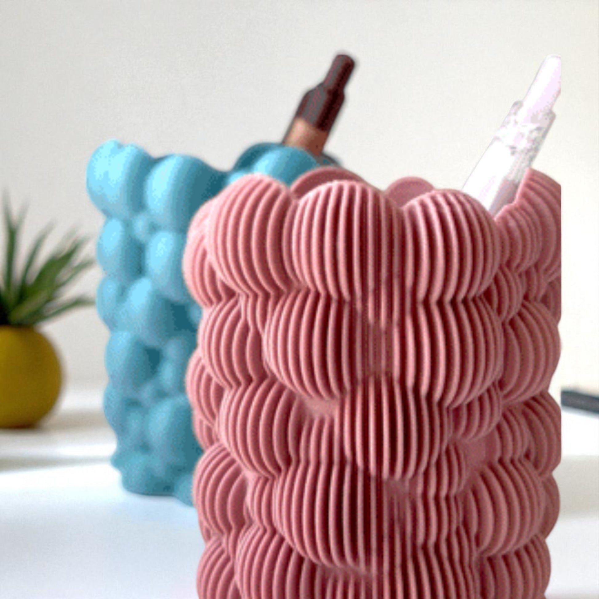 Bubbley Solid and Bubbley Lamel holders, versatile and stylish makeup brush or pen organizers with a playful bubble design, ideal for adding charm to office desks or vanity setups.