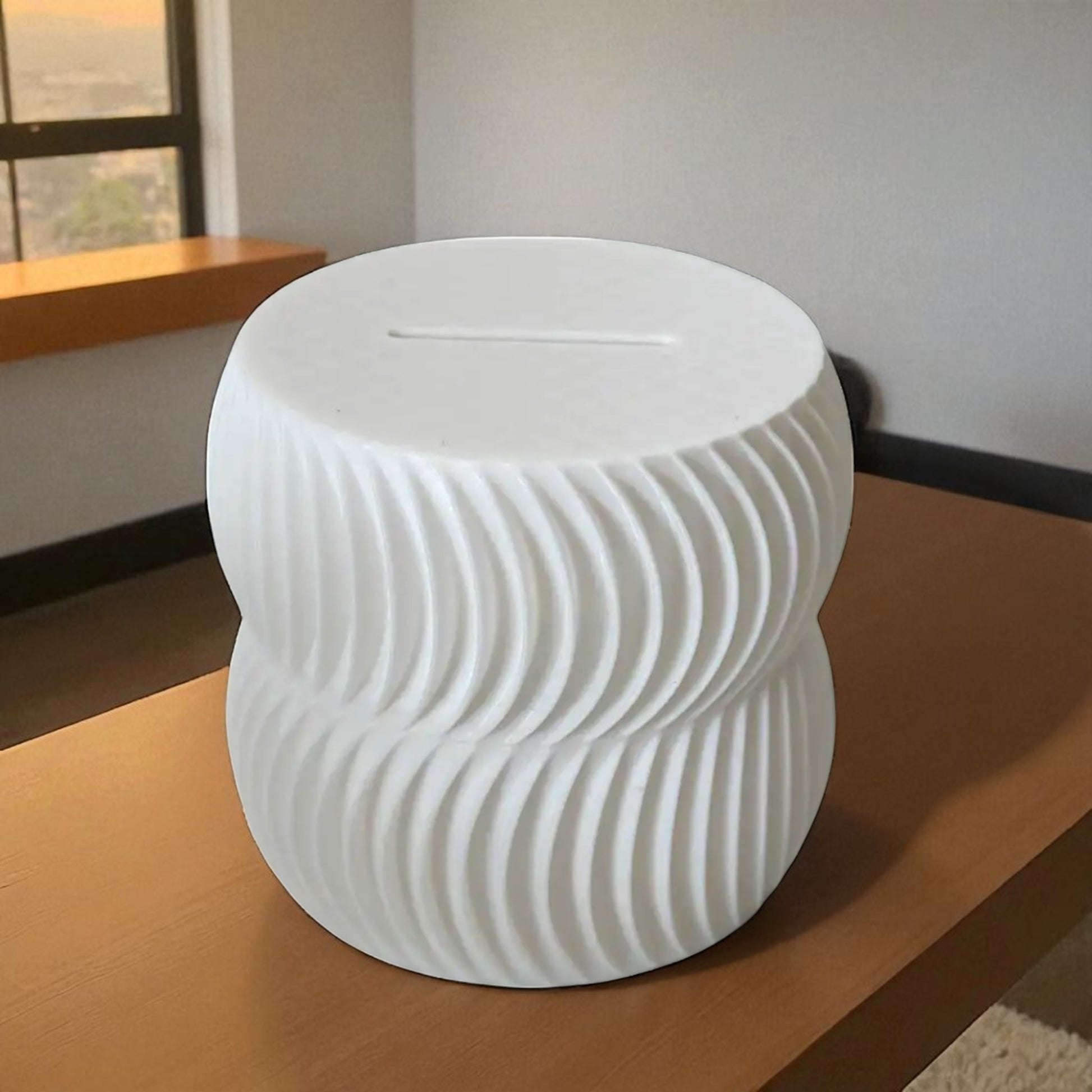  luxury coin bank designed to turn saving into a sophisticated experience. Available in two different sizes, this stylish coin bank seamlessly blends form and function, making it the perfect addition to any home or office. 