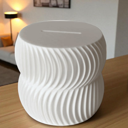  luxury coin bank designed to turn saving into a sophisticated experience. Available in two different sizes, this stylish coin bank seamlessly blends form and function, making it the perfect addition to any home or office. 