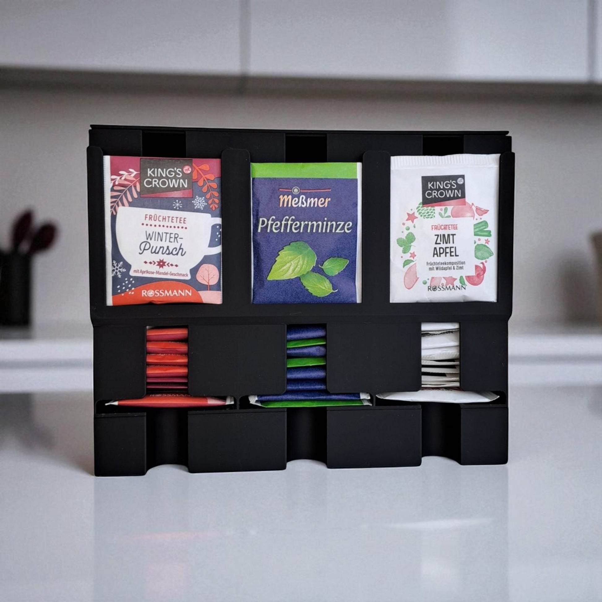 Modern tea organizer and dispenser with 3 compartments, compact and stylish design for tea bag storage, measuring 210mm x 85mm x 170mm, perfect for kitchens, pantries, or offices.