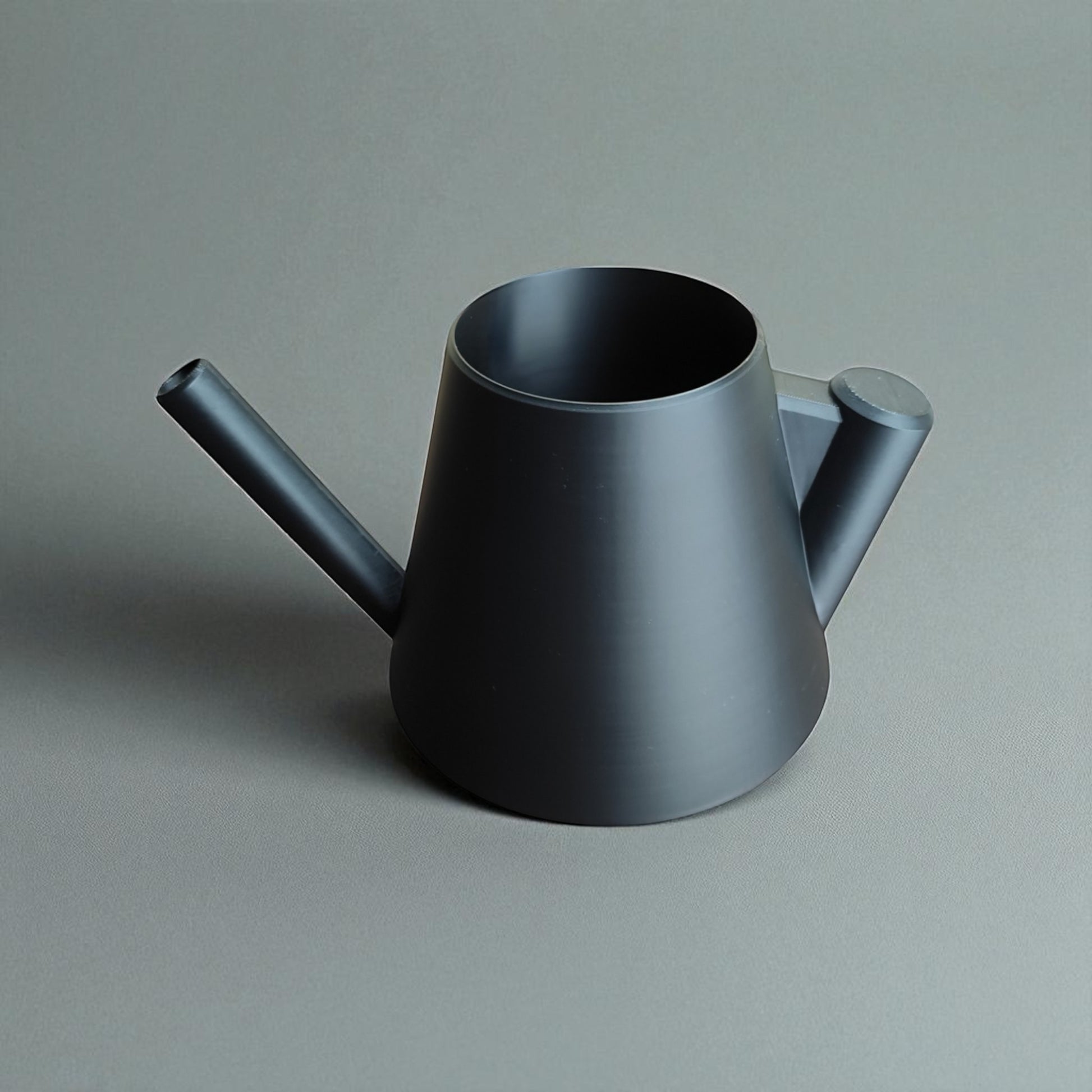 Modern stylish watering can with ergonomic handle – sleek design for indoor and outdoor plant care, perfect for precise and spill-free watering.