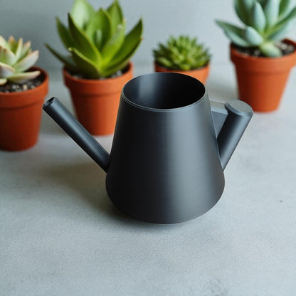 Modern stylish watering can with ergonomic handle – sleek design for indoor and outdoor plant care, perfect for precise and spill-free watering.