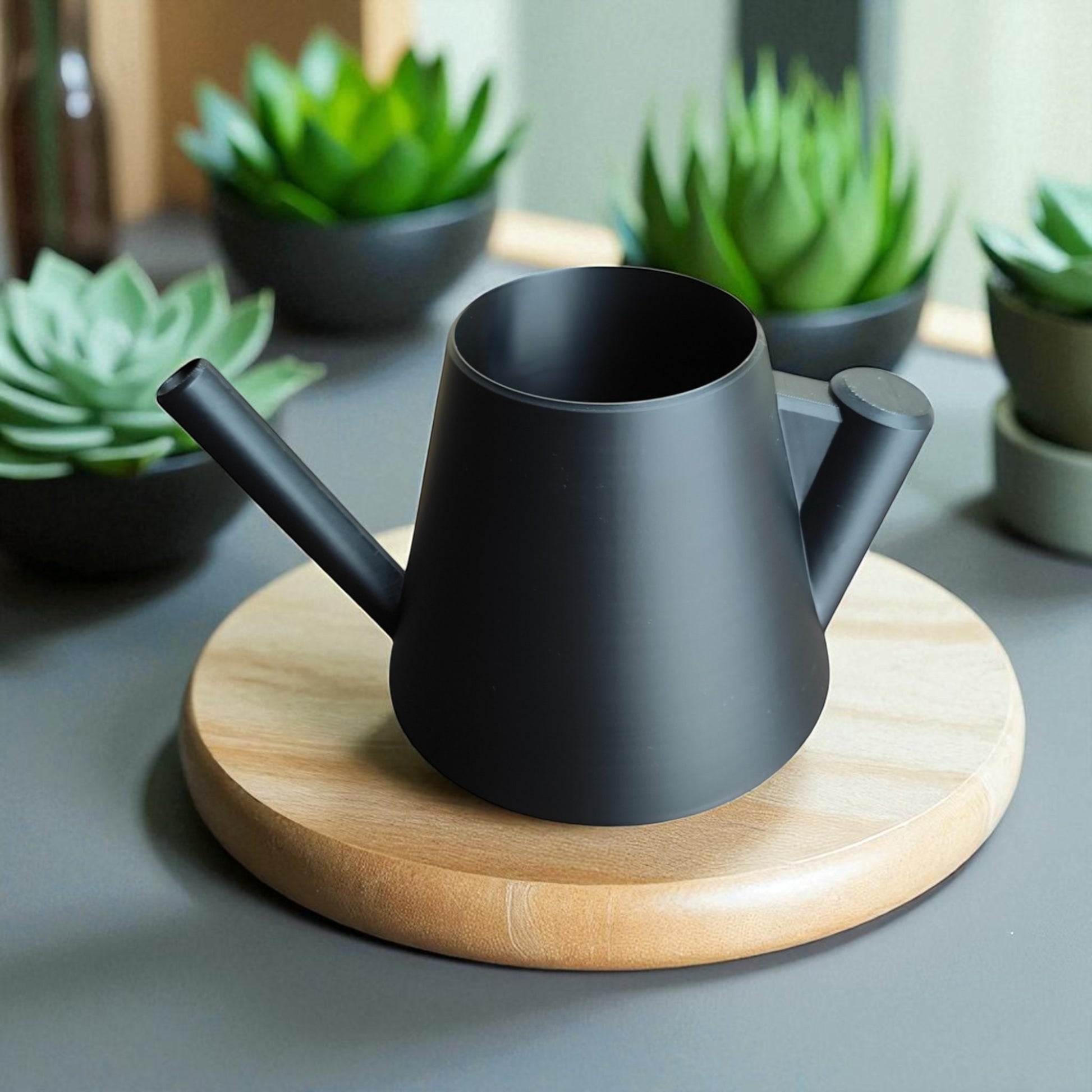 Modern stylish watering can with ergonomic handle – sleek design for indoor and outdoor plant care, perfect for precise and spill-free watering.