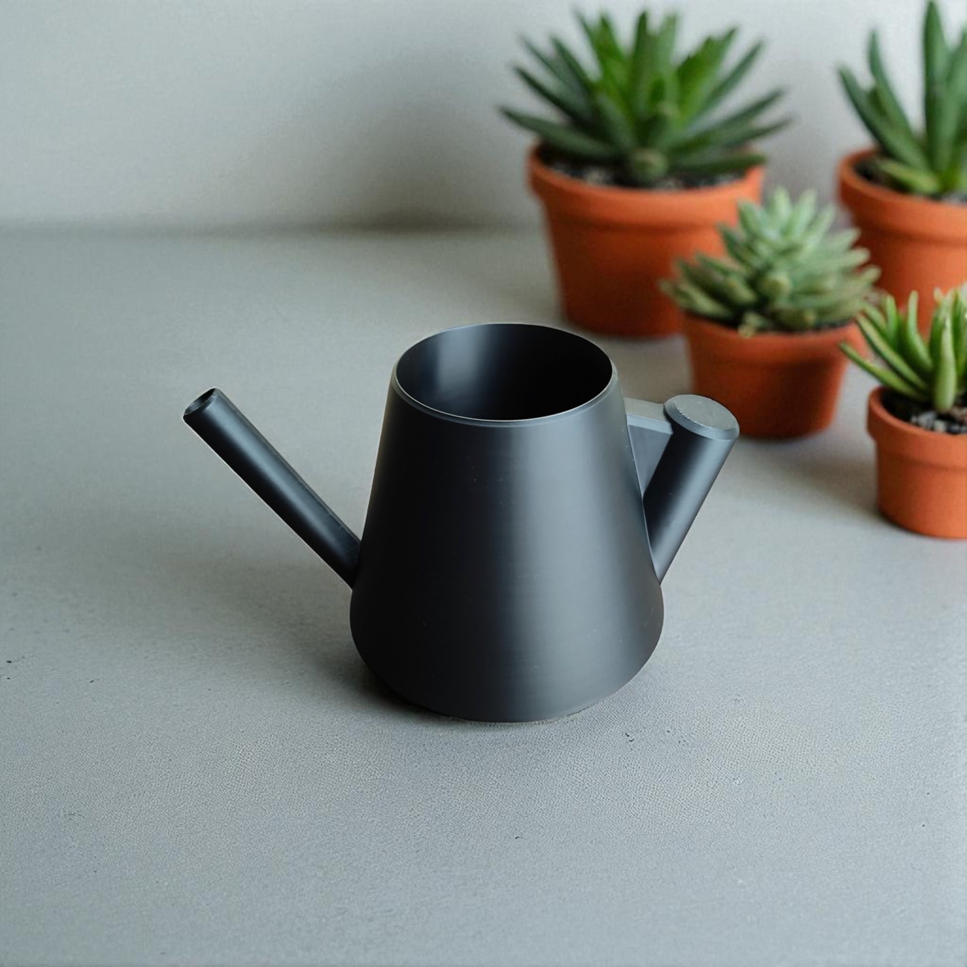Modern stylish watering can with ergonomic handle – sleek design for indoor and outdoor plant care, perfect for precise and spill-free watering.