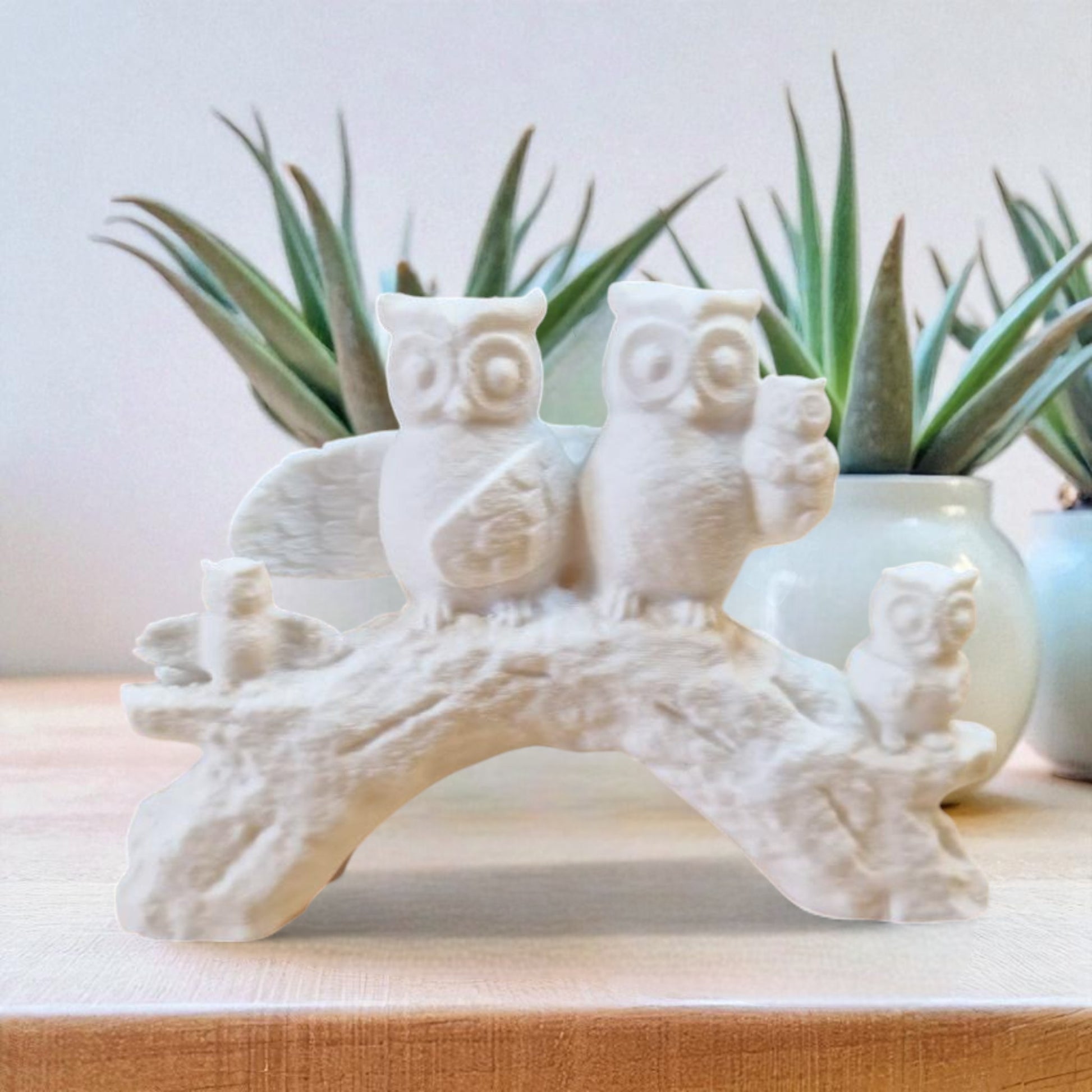 A heartwarming owl family statue symbolizing the unbreakable bond of love and connection, whether in humans or animals. A meaningful decor piece for any space.