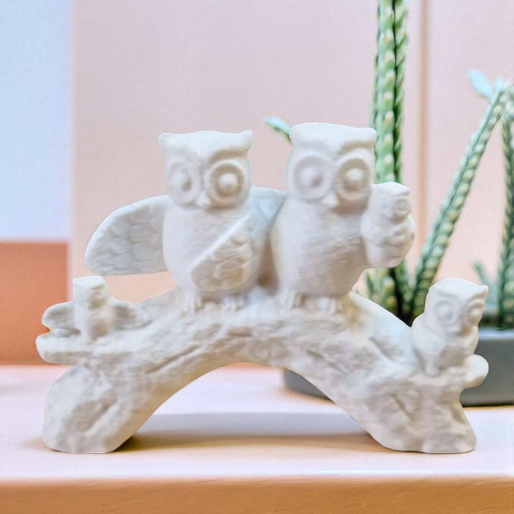 A heartwarming owl family statue symbolizing the unbreakable bond of love and connection, whether in humans or animals. A meaningful decor piece for any space.