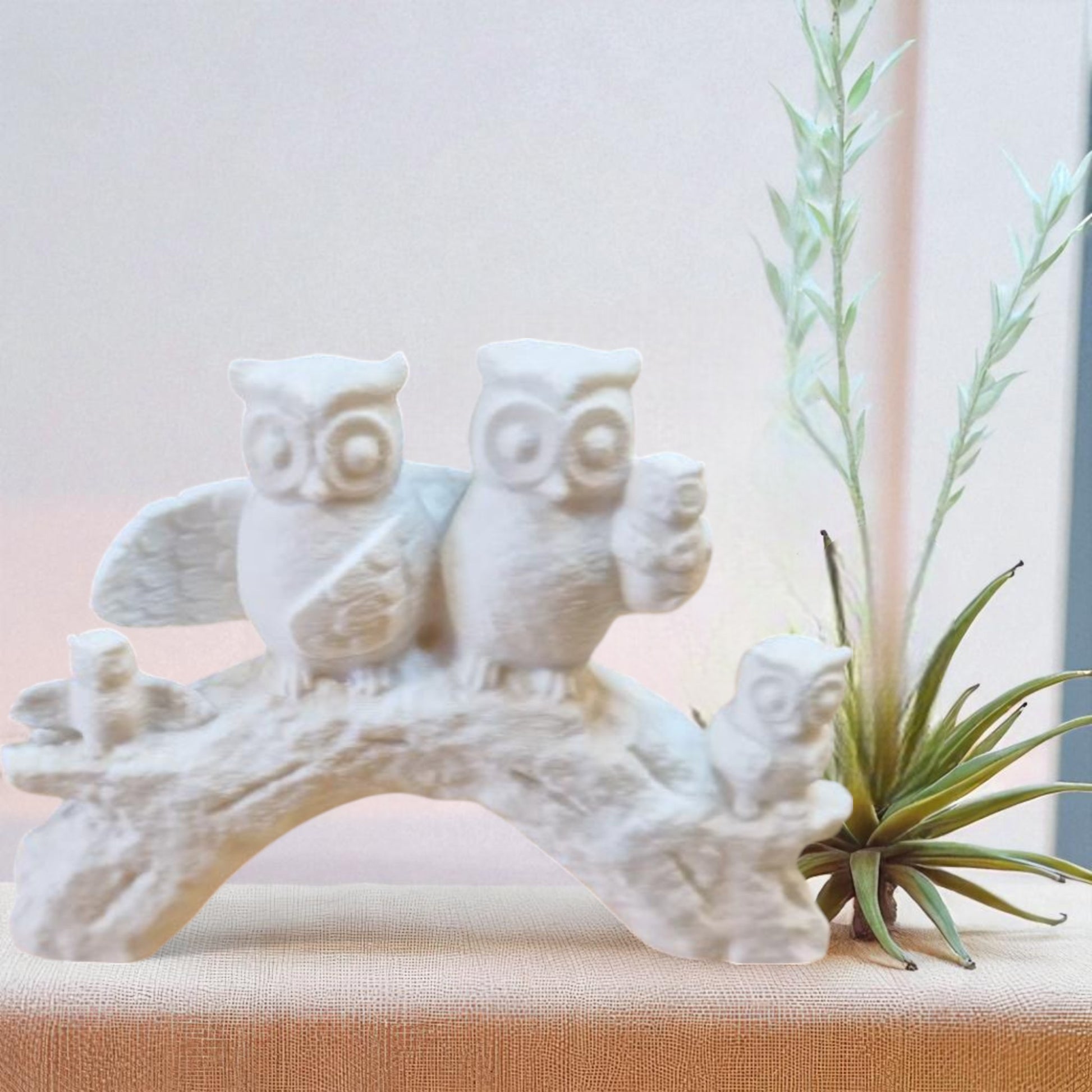 A heartwarming owl family statue symbolizing the unbreakable bond of love and connection, whether in humans or animals. A meaningful decor piece for any space.