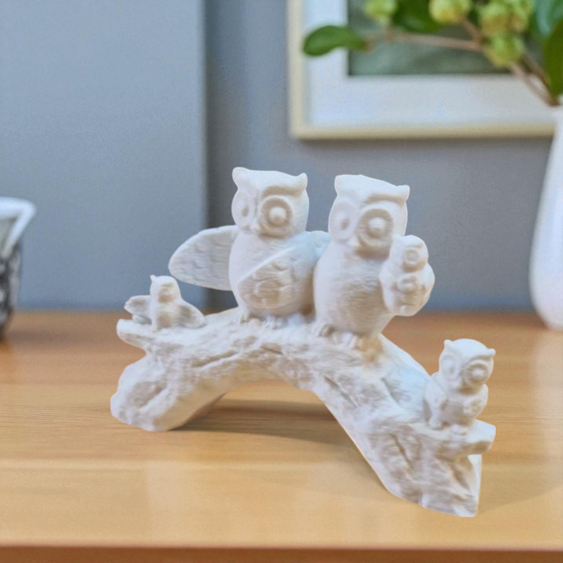 A heartwarming owl family statue symbolizing the unbreakable bond of love and connection, whether in humans or animals. A meaningful decor piece for any space.