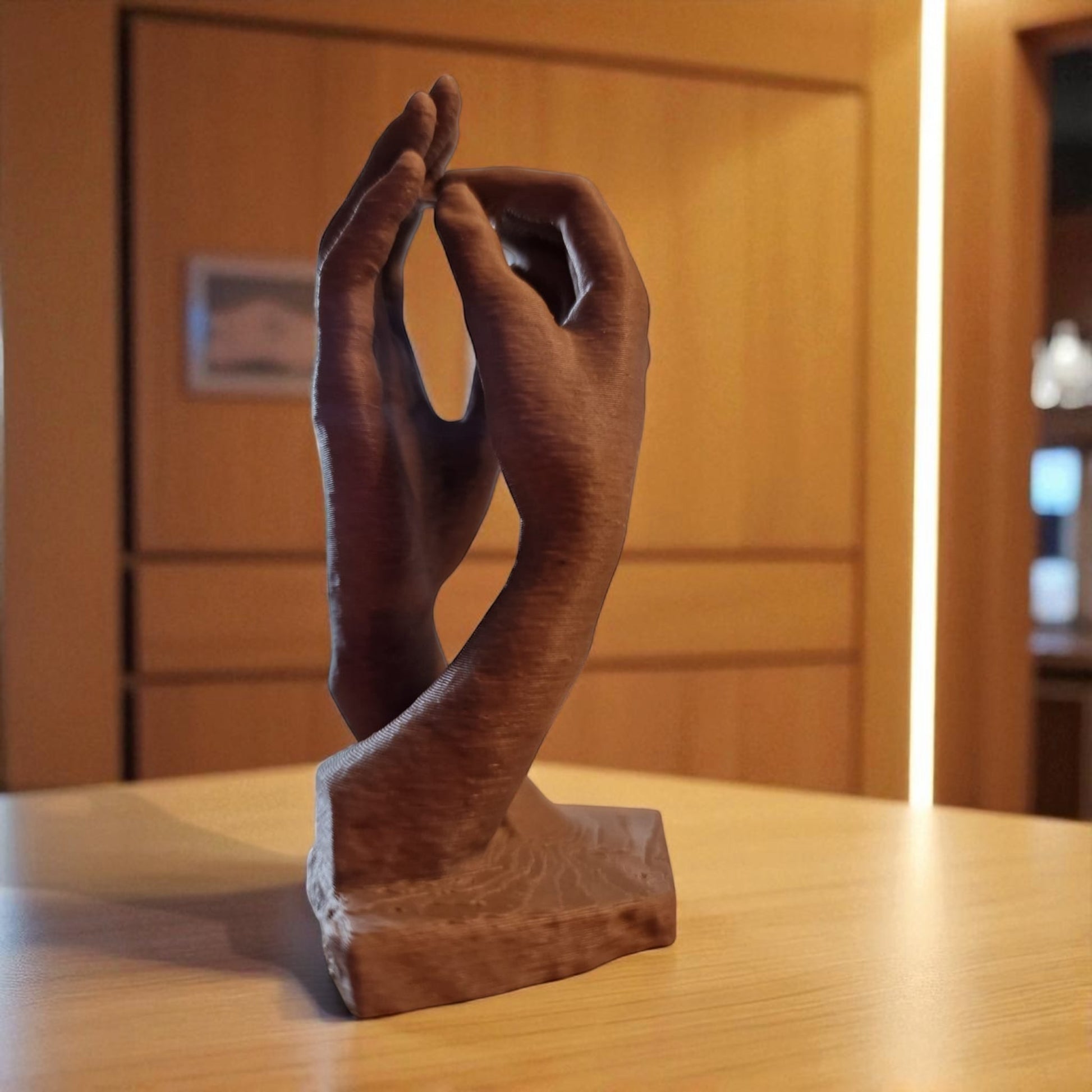  two elegantly crafted hands reaching out and touching, symbolizing connection, unity, and timeless bond. The design features  flowing curves that its artistic and modern aesthetic, making it a perfect decorative piece for any space.