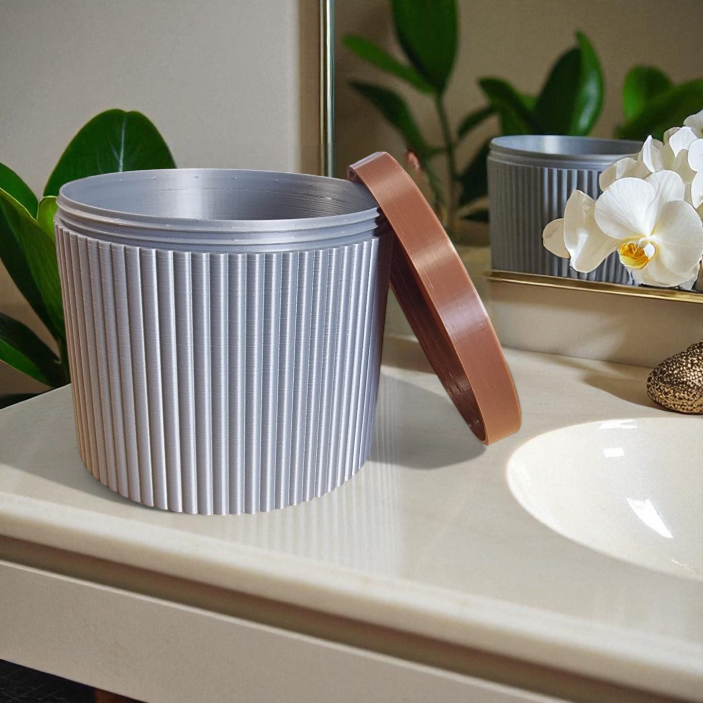 a stylish and practical toilet paper holder box designed to fit a whole roll, keeping it safe from kids and pets. features a small opening for easy access while maintaining a clean and organized look.