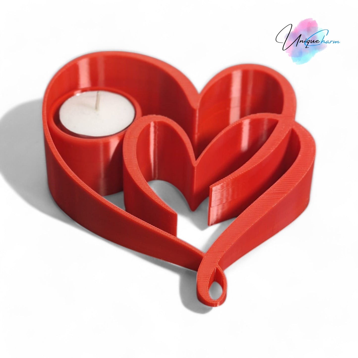 heart candle holder with a romantic double heart design, perfect for tealight candles and creating a warm, elegant ambiance for home decor or special occasions.