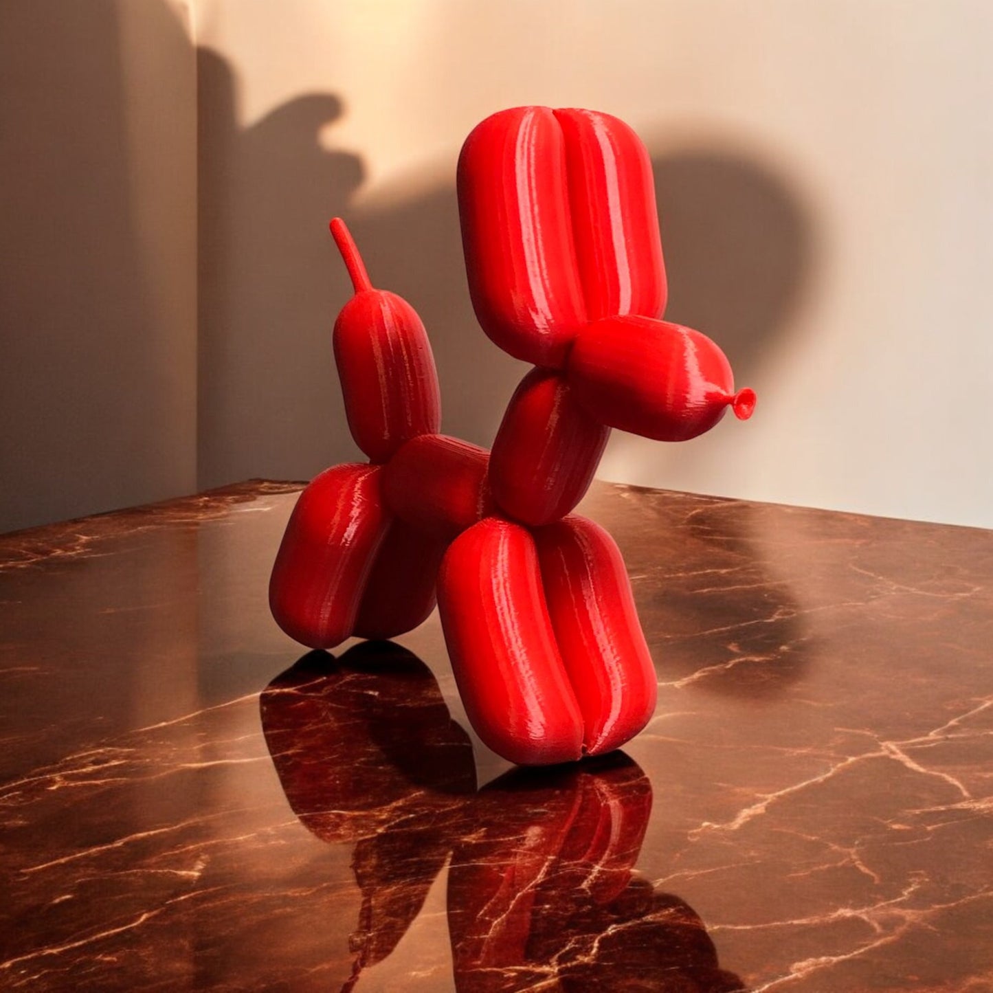 3d-printed figurine resembling a playful dog made from balloons, available in three different sizes. perfect for home decor, kids' rooms, or as a unique gift for dog lovers.