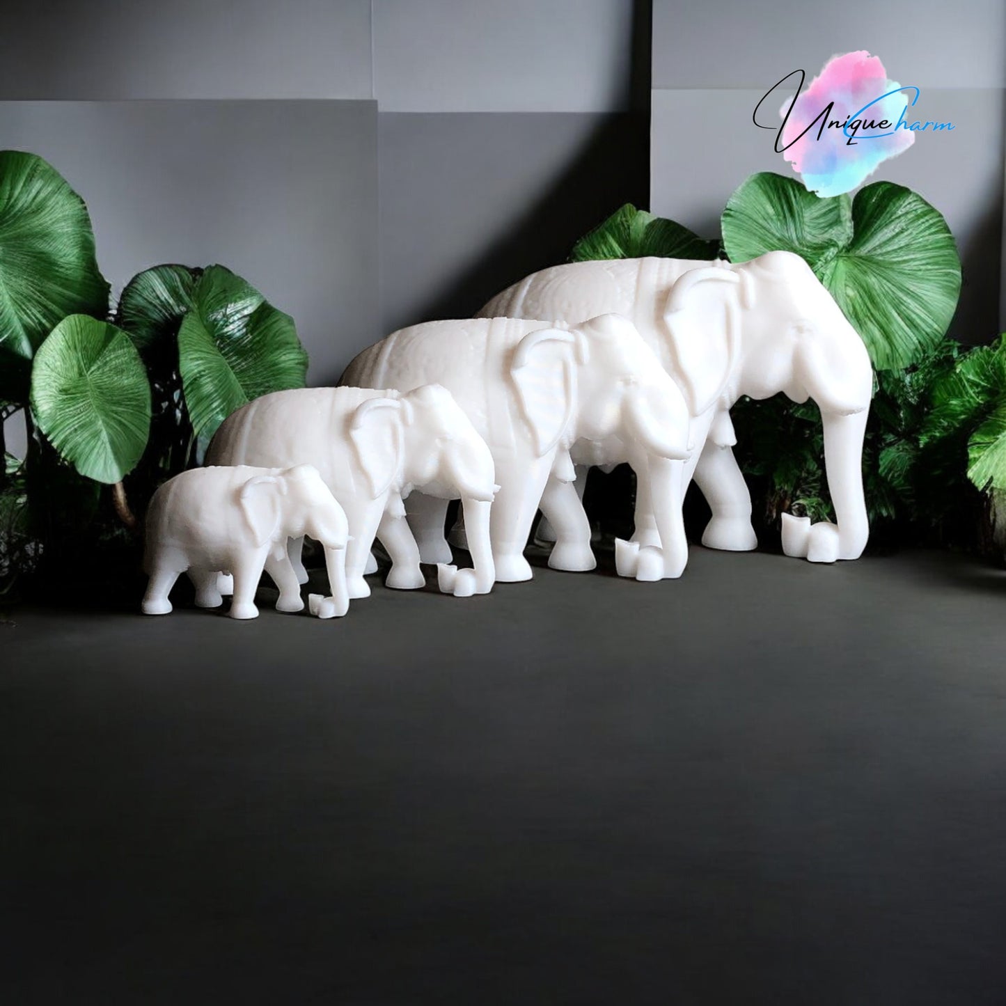 set of 4 indian elephant figurines in varying sizes, 3d-printed with intricate details. modern and elegant home decor piece, perfect for shelves, desks, and gifting. symbolizing wisdom, luck, and prosperity, these minimalist elephant sculptures add a spiritual and stylish touch to any space.