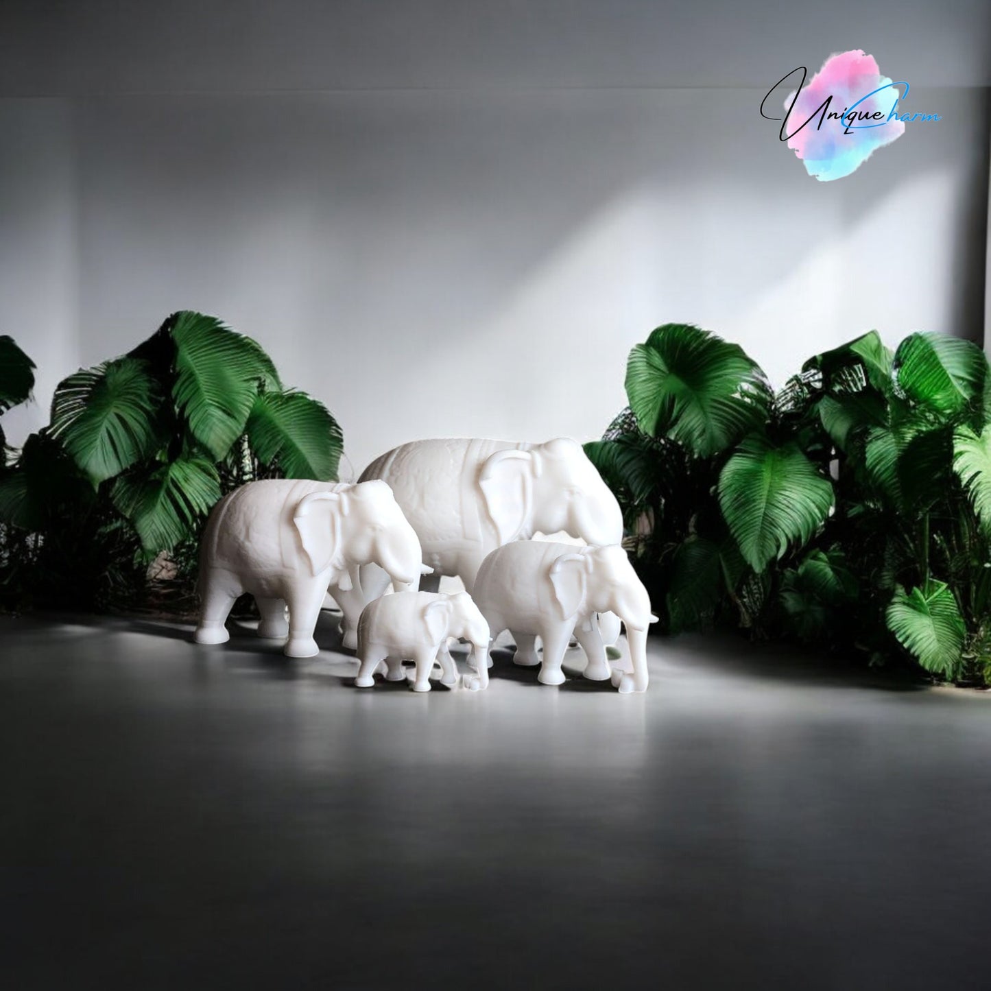 set of 4 indian elephant figurines in varying sizes, 3d-printed with intricate details. modern and elegant home decor piece, perfect for shelves, desks, and gifting. symbolizing wisdom, luck, and prosperity, these minimalist elephant sculptures add a spiritual and stylish touch to any space.