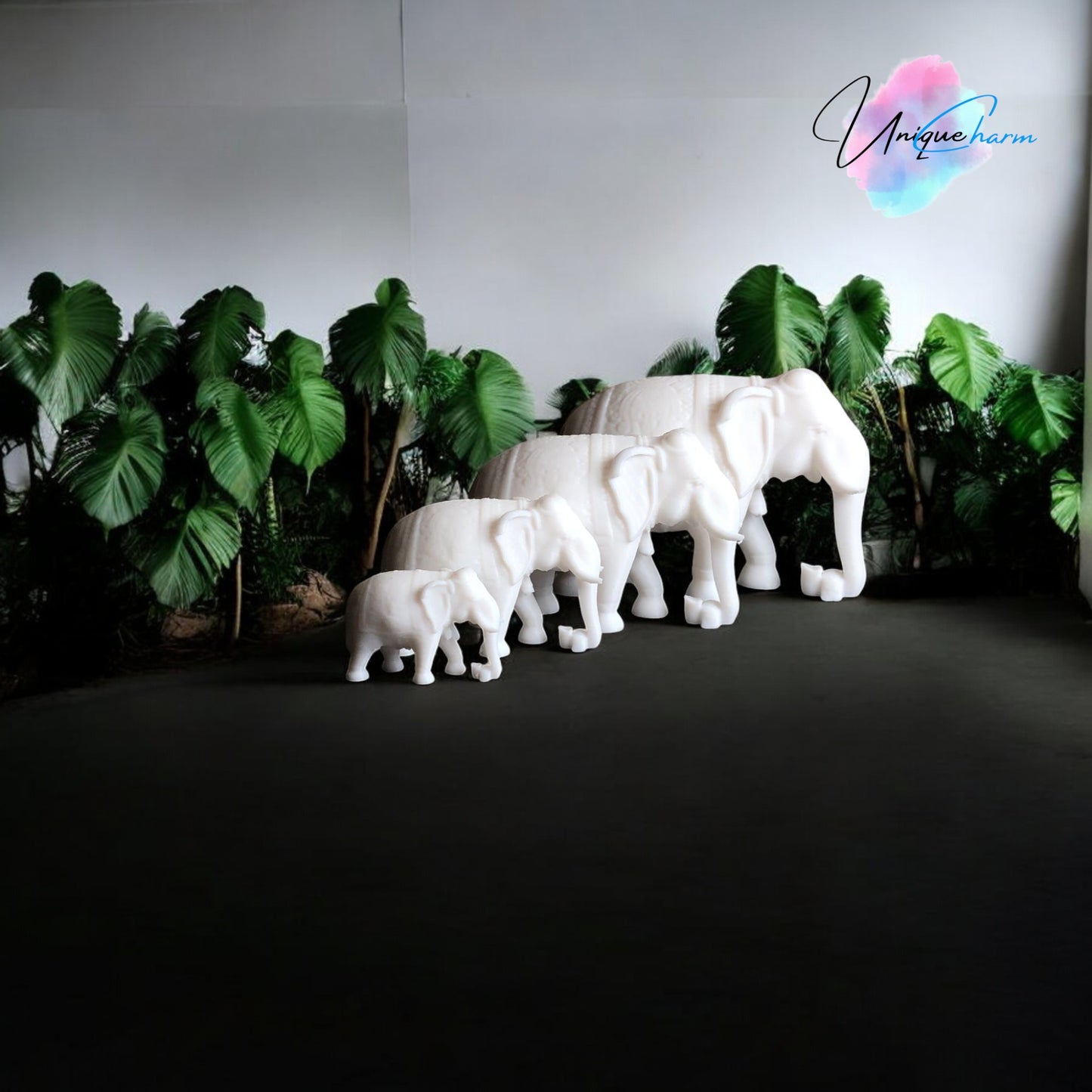 set of 4 indian elephant figurines in varying sizes, 3d-printed with intricate details. modern and elegant home decor piece, perfect for shelves, desks, and gifting. symbolizing wisdom, luck, and prosperity, these minimalist elephant sculptures add a spiritual and stylish touch to any space.