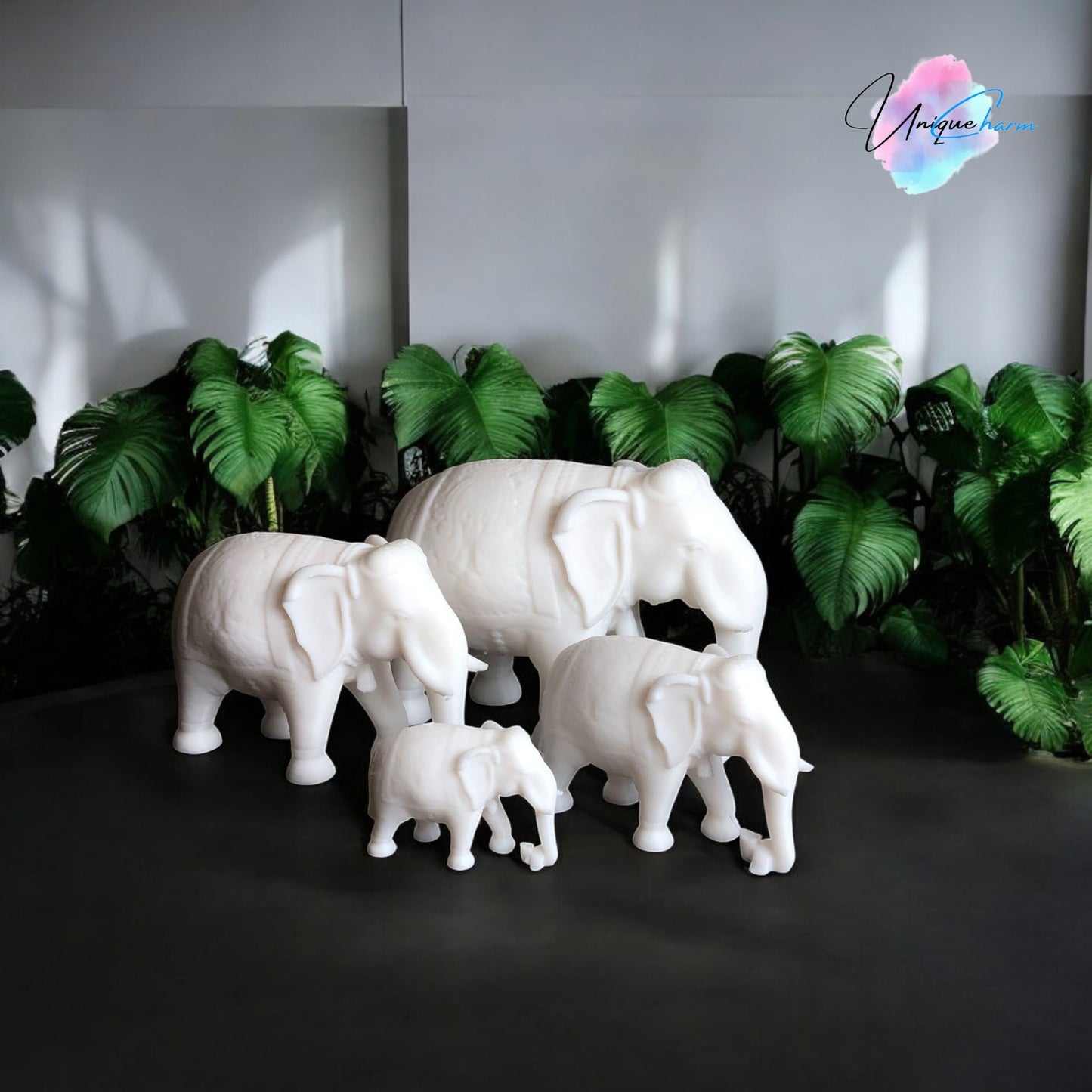 set of 4 indian elephant figurines in varying sizes, 3d-printed with intricate details. modern and elegant home decor piece, perfect for shelves, desks, and gifting. symbolizing wisdom, luck, and prosperity, these minimalist elephant sculptures add a spiritual and stylish touch to any space.