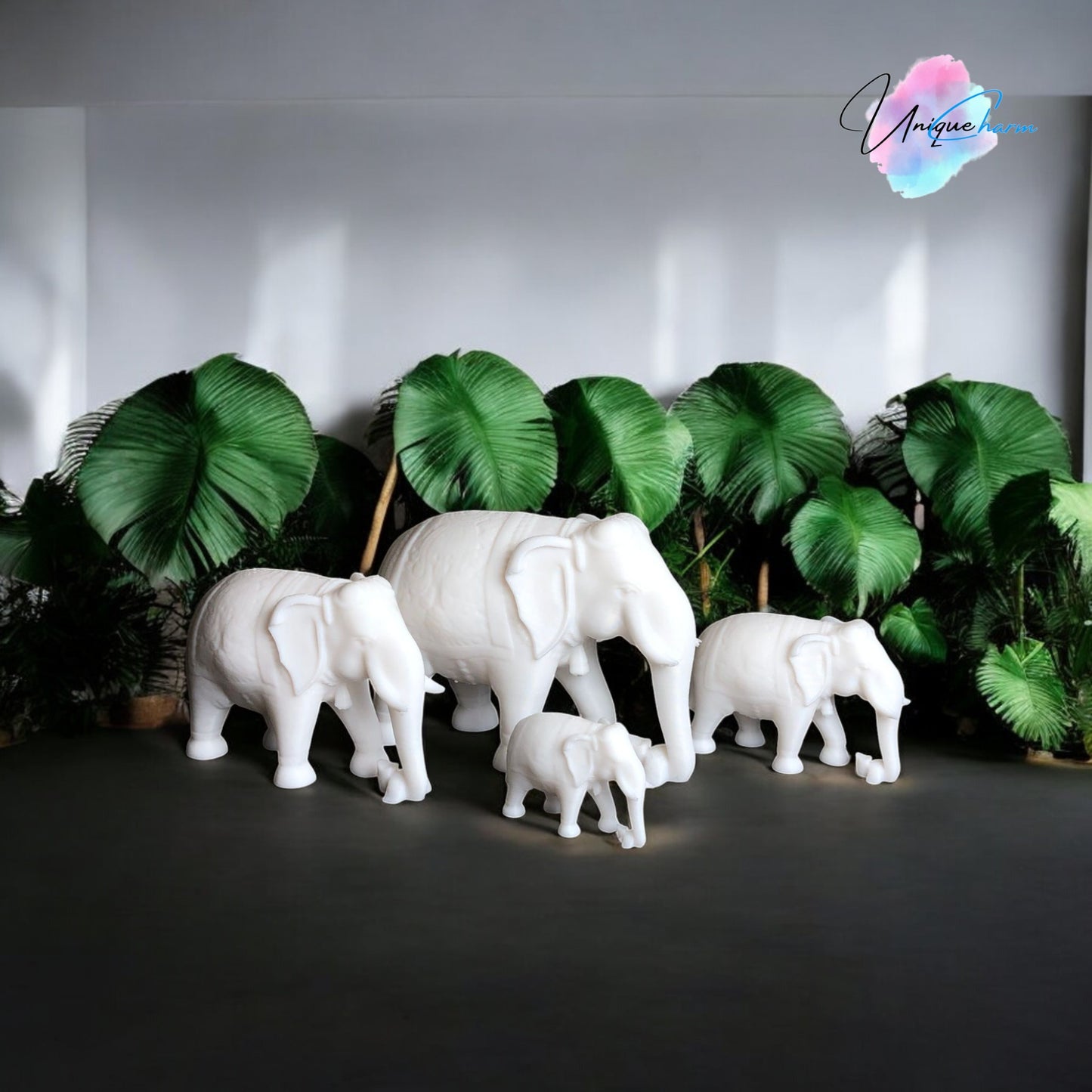 set of 4 indian elephant figurines in varying sizes, 3d-printed with intricate details. modern and elegant home decor piece, perfect for shelves, desks, and gifting. symbolizing wisdom, luck, and prosperity, these minimalist elephant sculptures add a spiritual and stylish touch to any space.