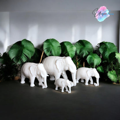 Set of 4 Indian elephant figurines in varying sizes, 3D-printed with intricate details. Modern and elegant home decor piece, perfect for shelves, desks, and gifting. Symbolizing wisdom, luck, and prosperity, these minimalist elephant sculptures add a spiritual and stylish touch to any space.