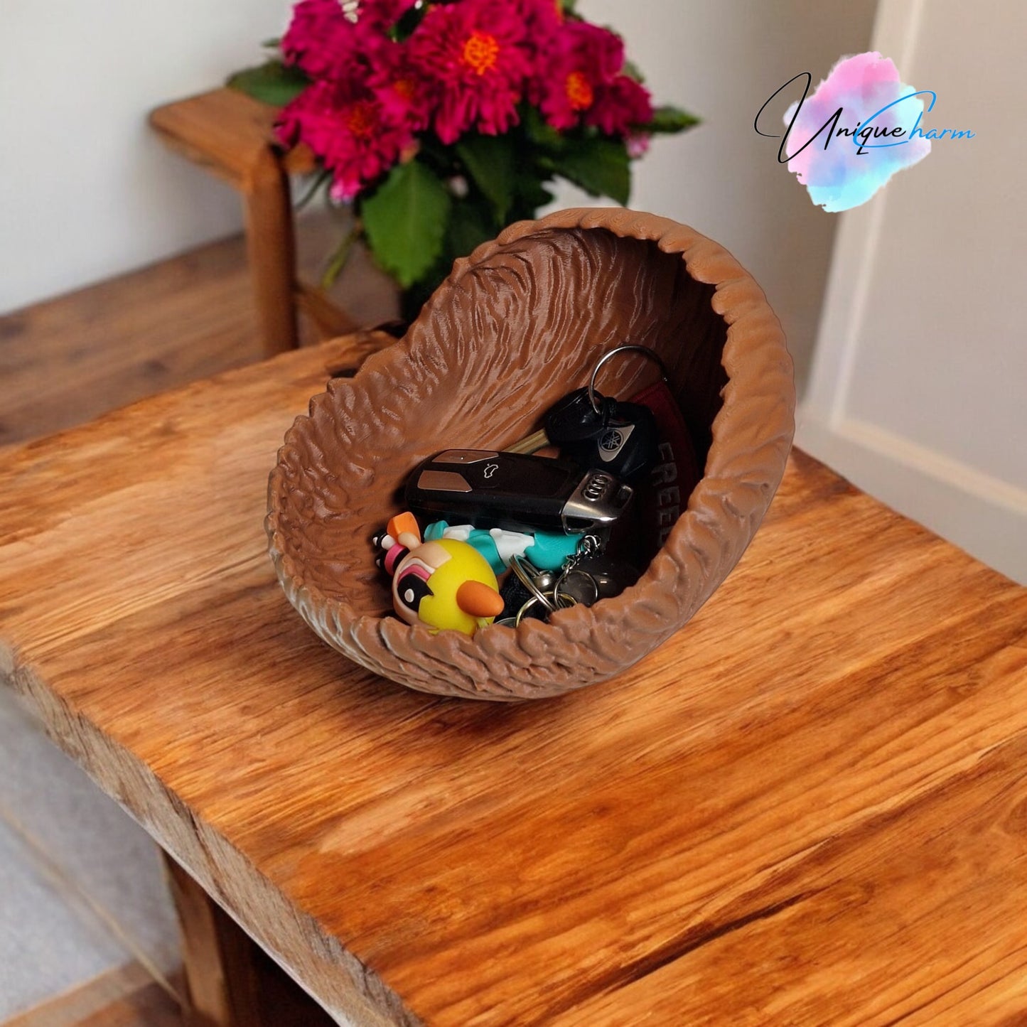 a beautifully designed walnut-shaped bowl resembling a quarter of a walnut shell, perfect as a key tray, candy dish, or nut bowl. features a rustic, nature-inspired design with a smooth finish, making it a stylish and functional home décor piece.