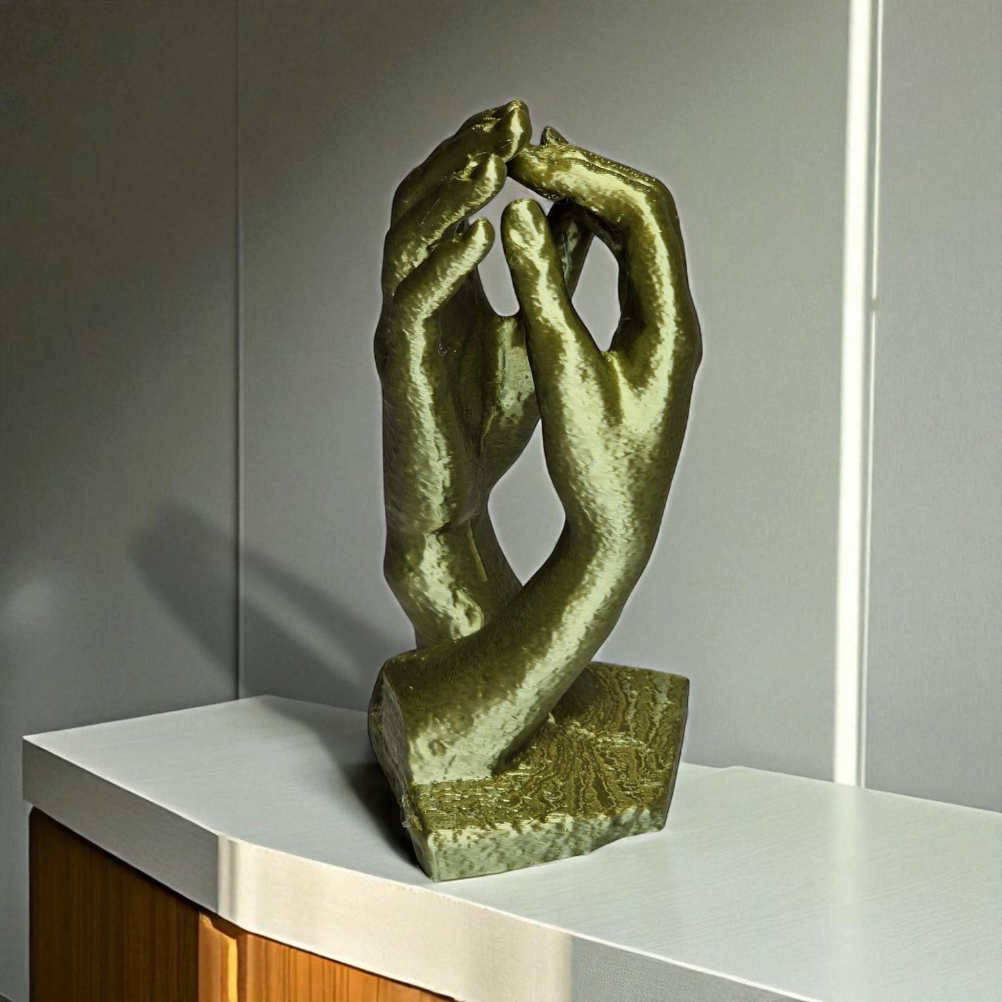  two elegantly crafted hands reaching out and touching, symbolizing connection, unity, and timeless bond. the design features  flowing curves that its artistic and modern aesthetic, making it a perfect decorative piece for any space.