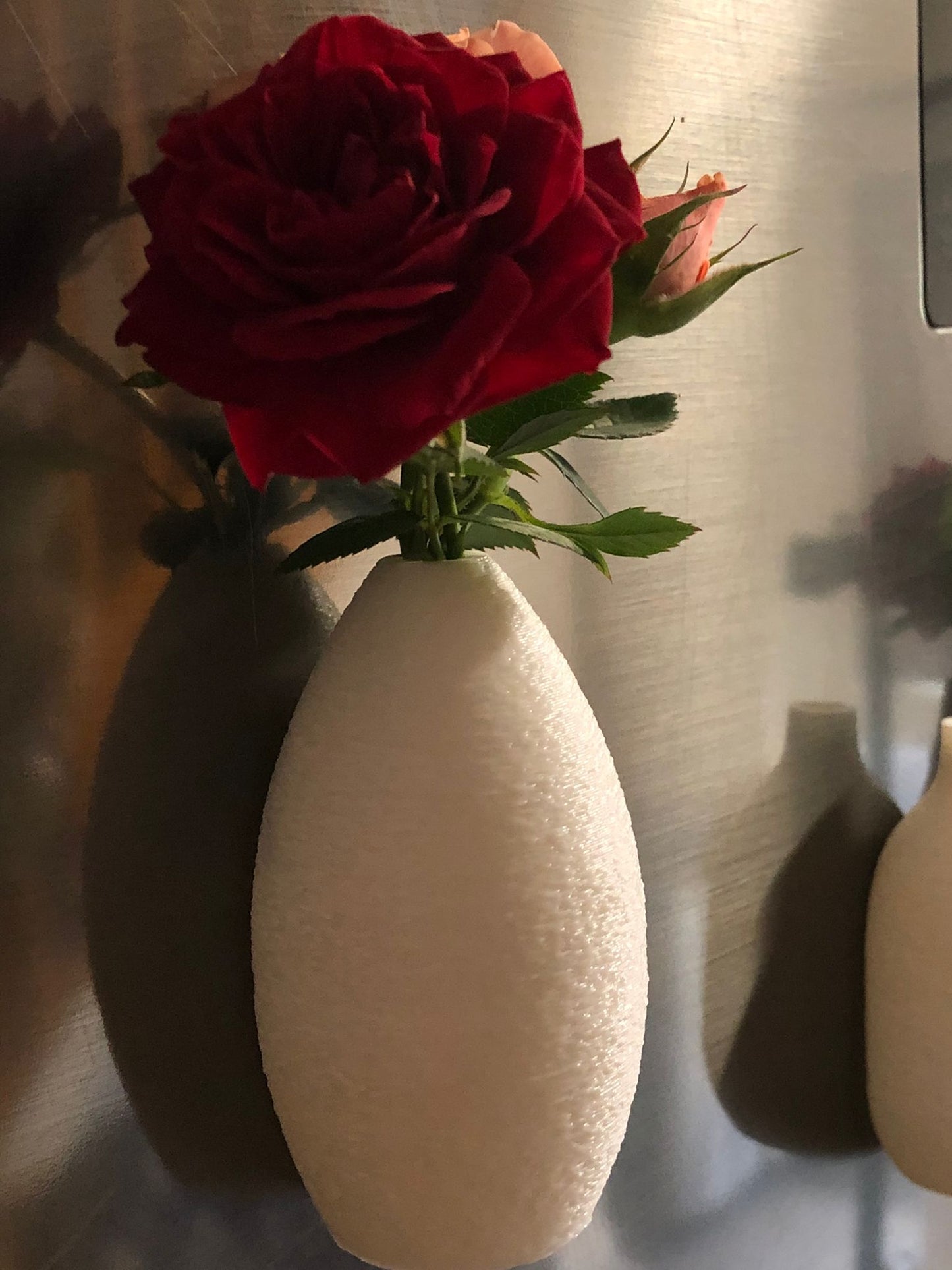 set of 5 colorful mini magnetic vases on a fridge, each holding small wildflowers, perfect for fridge decor, tiny flower holder, or gift for mom.
