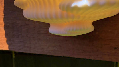 3D printed mushroom-inspired wall shelf with organic sculptural design, made from white PLA and includes mounting hardware and tape.
