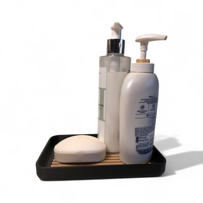 Modern soap tray with raised drainage support, shown holding a soap bar and pump bottle, perfect for bathroom organization and keeping soap dry

