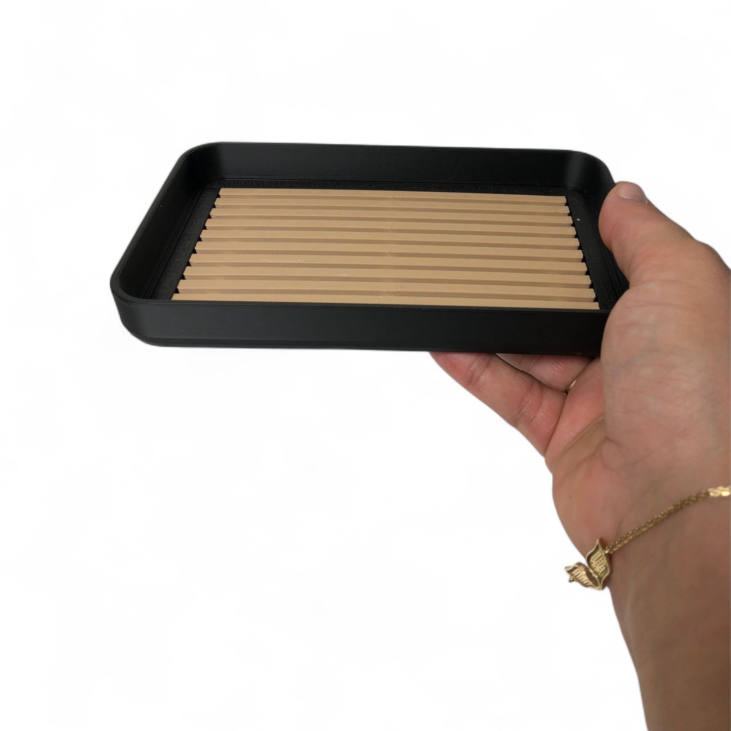 modern soap tray with raised drainage support, shown holding a soap bar and pump bottle, perfect for bathroom organization and keeping soap dry

