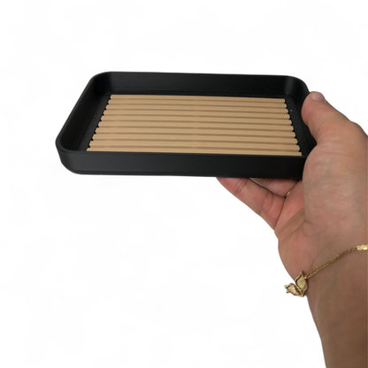 Modern soap tray with raised drainage support, shown holding a soap bar and pump bottle, perfect for bathroom organization and keeping soap dry

