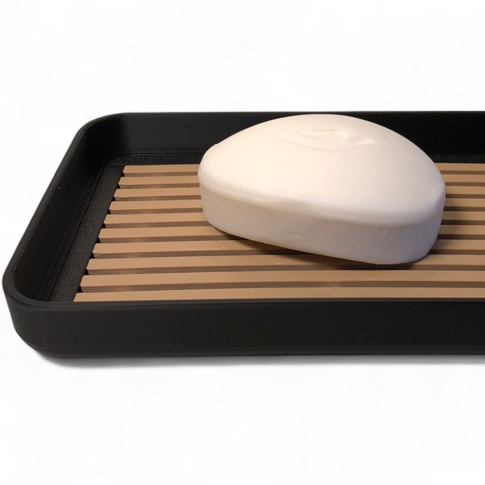 Modern soap tray with raised drainage support, shown holding a soap bar and pump bottle, perfect for bathroom organization and keeping soap dry

