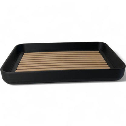 Modern soap tray with raised drainage support, shown holding a soap bar and pump bottle, perfect for bathroom organization and keeping soap dry

