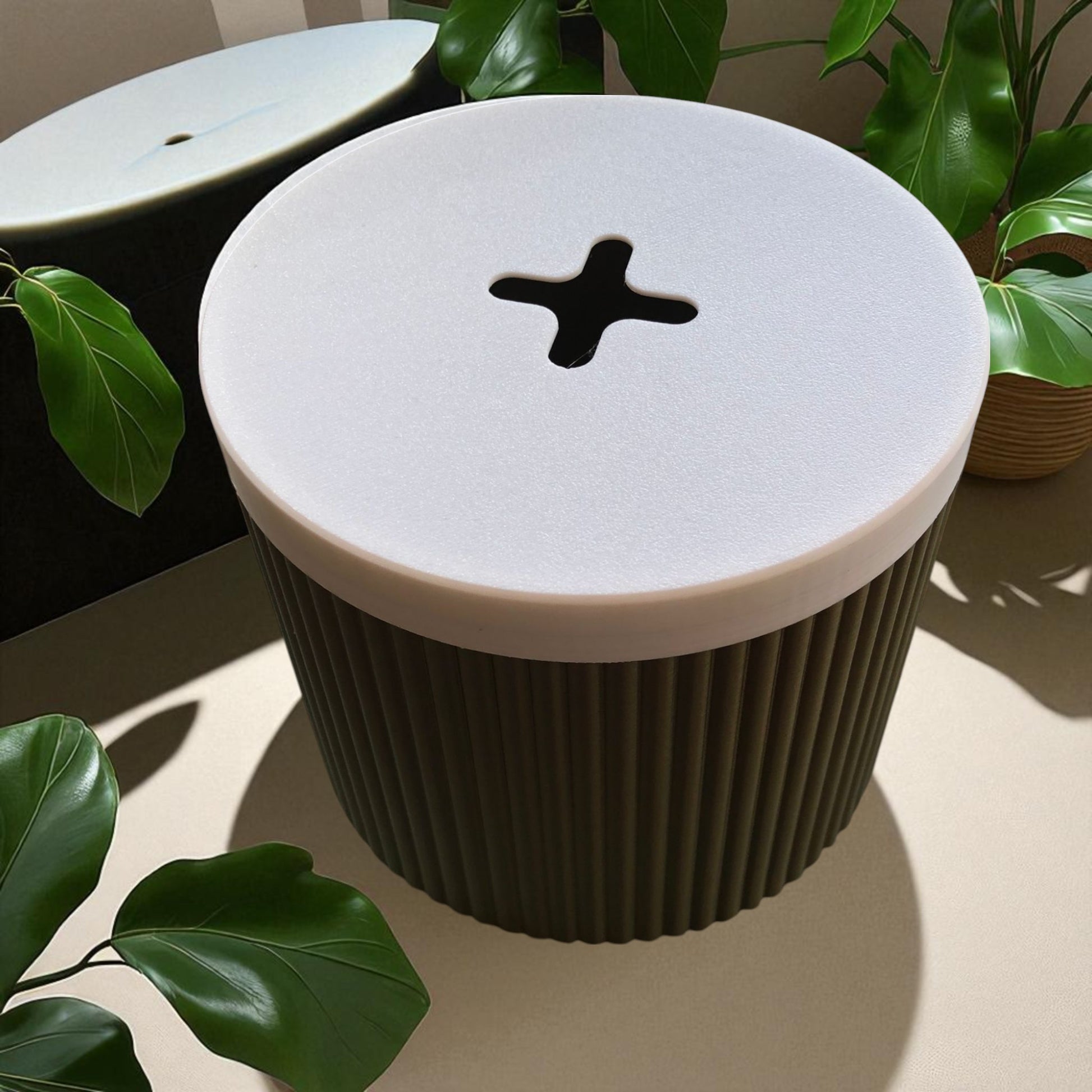 A stylish and practical toilet paper holder box designed to fit a whole roll, keeping it safe from kids and pets. Features a small opening for easy access while maintaining a clean and organized look.