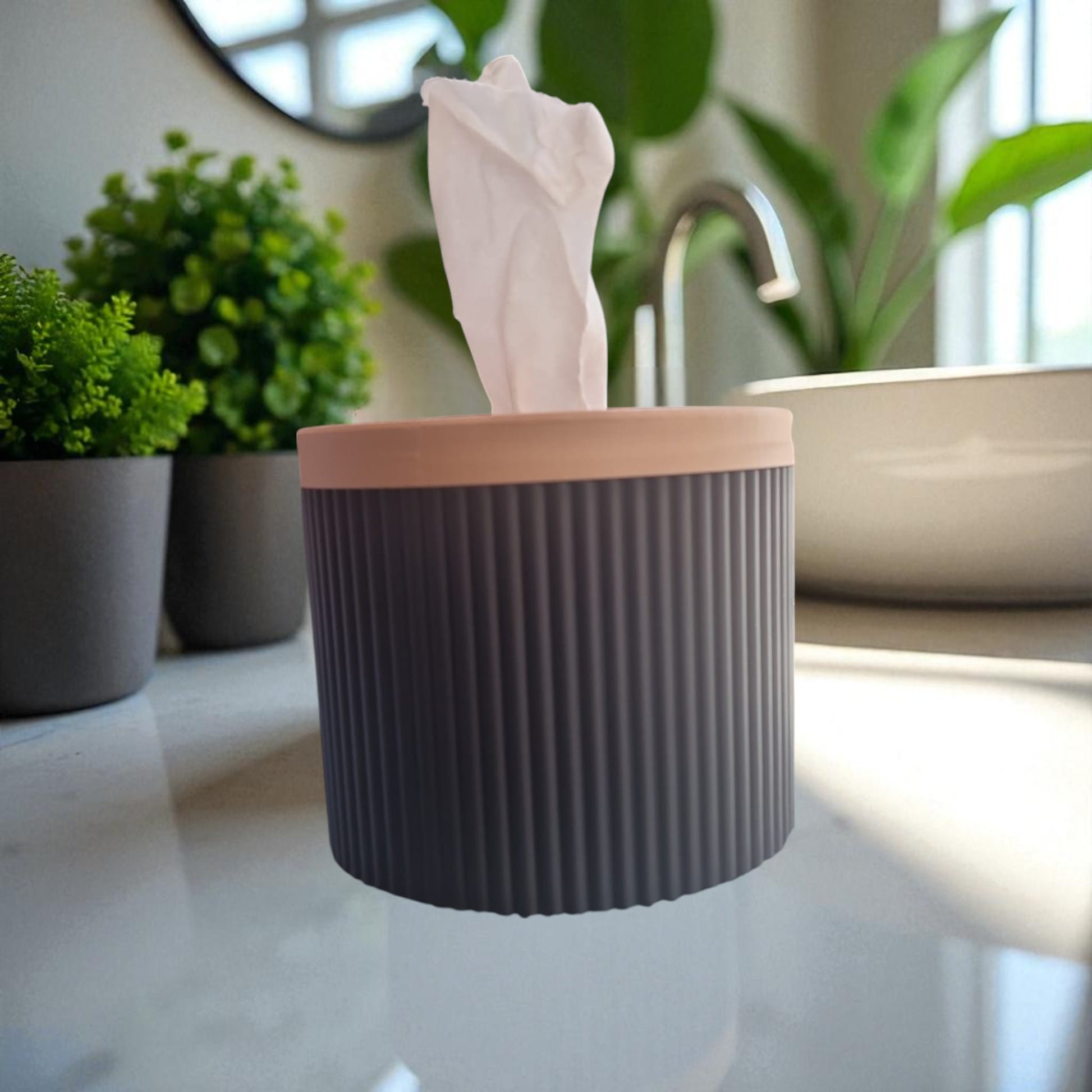 A stylish and practical toilet paper holder box designed to fit a whole roll, keeping it safe from kids and pets. Features a small opening for easy access while maintaining a clean and organized look.