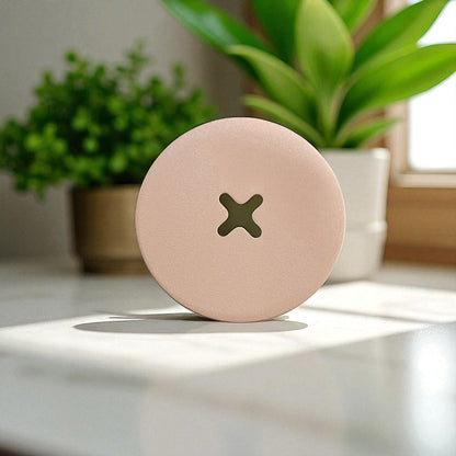 A stylish and practical toilet paper holder box designed to fit a whole roll, keeping it safe from kids and pets. Features a small opening for easy access while maintaining a clean and organized look.