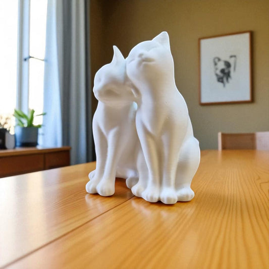 A heartwarming statue of two cats, symbolizing love and companionship between animals. Perfect for cat lovers and a charming addition to any home decor.