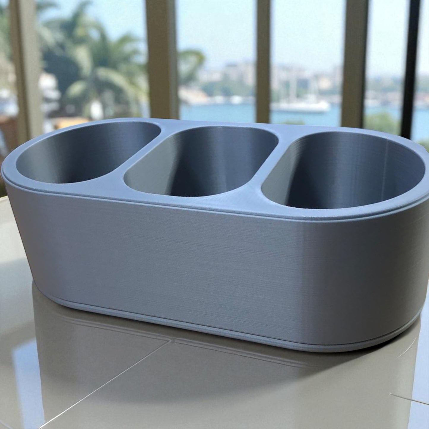 round remote holder a sleek remote holder with three compartments, perfect for organizing remotes, small accessories, or gadgets while adding a modern touch to your living space