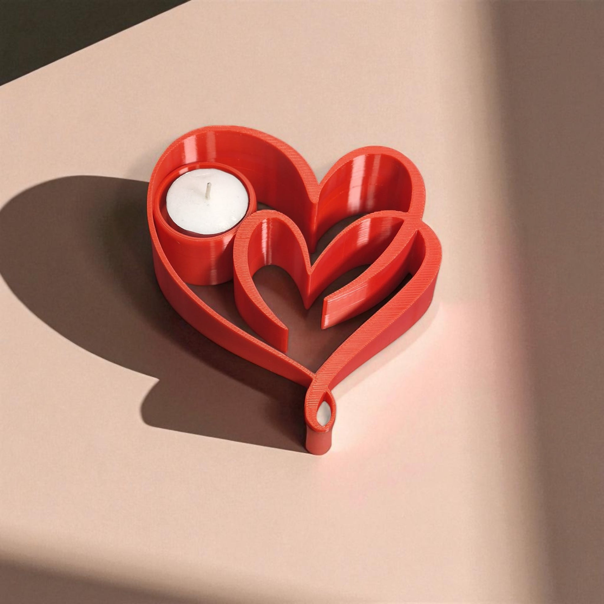 Heart Candle Holder with a romantic double heart design, perfect for tealight candles and creating a warm, elegant ambiance for home decor or special occasions.