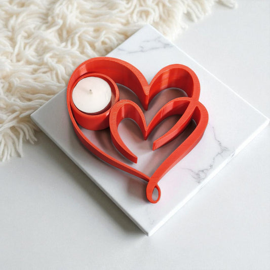 Heart Candle Holder with a romantic double heart design, perfect for tealight candles and creating a warm, elegant ambiance for home decor or special occasions.