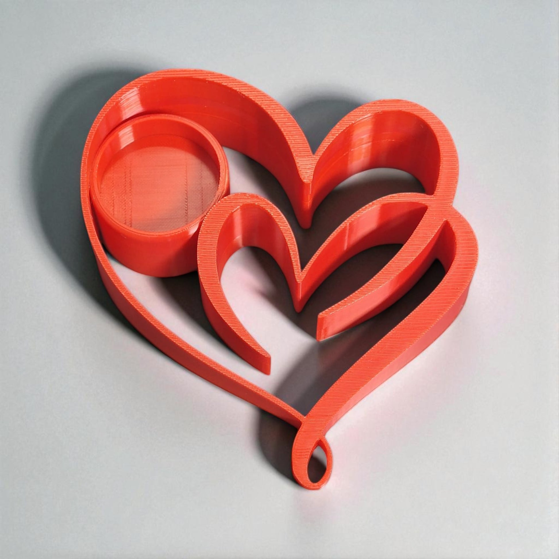 Heart Candle Holder with a romantic double heart design, perfect for tealight candles and creating a warm, elegant ambiance for home decor or special occasions.