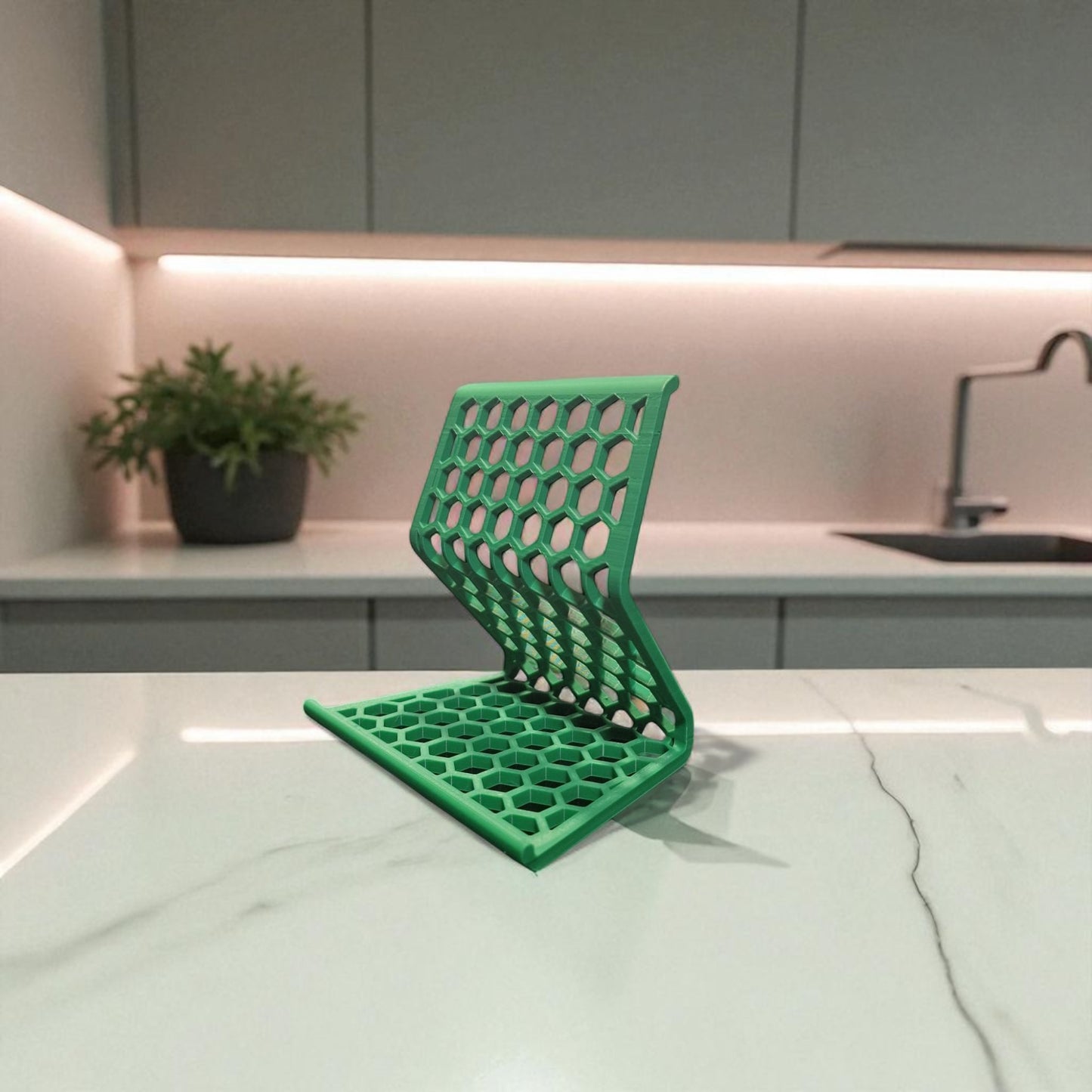 honeycomb stand: a versatile and stylish stand with a honeycomb pattern, designed to hold phones, tablets, and kindles securely at an optimal viewing angle, blending functionality with modern design.