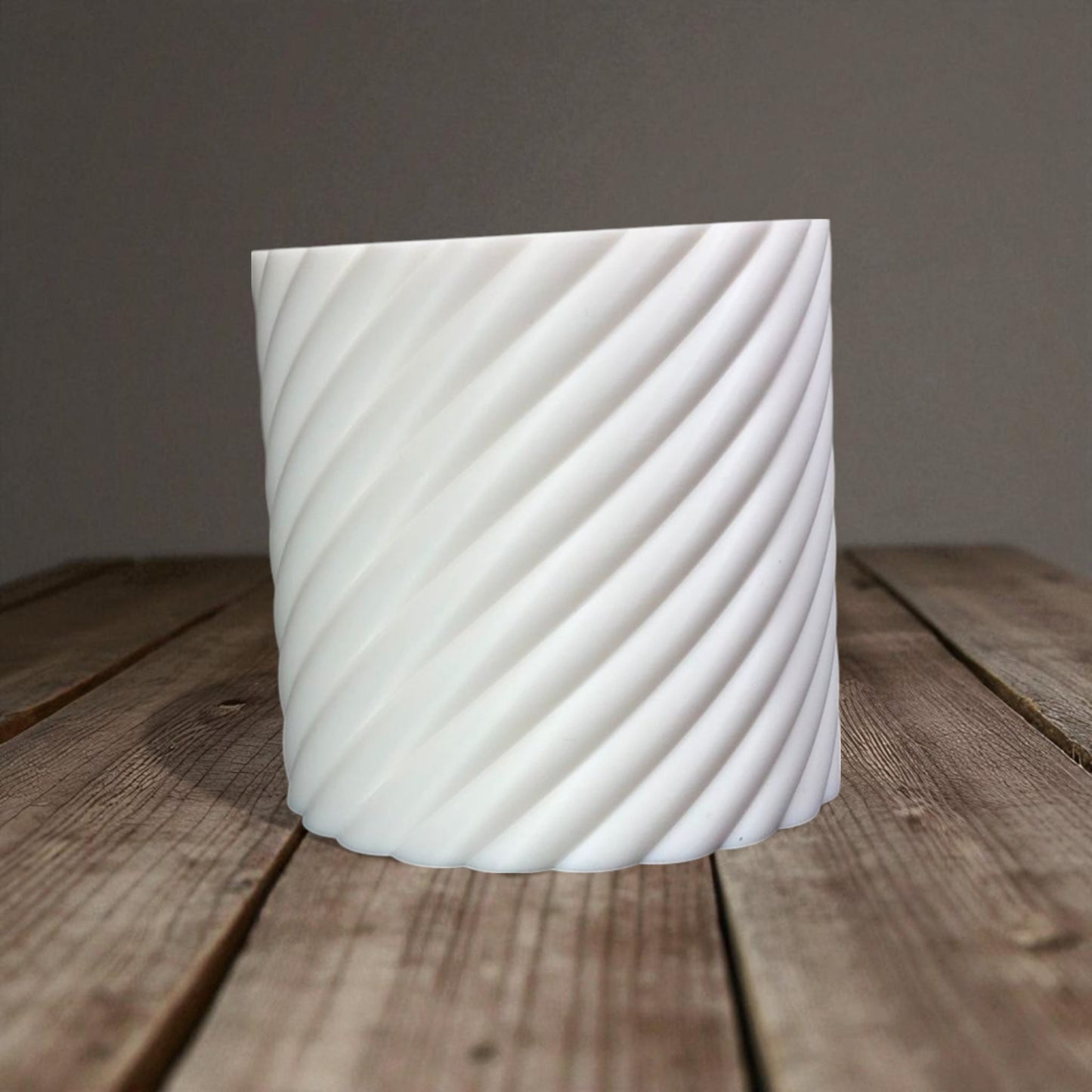 a modern spiral coin bank with a unique closing mechanism. features a sleek, minimalist design where coins drop smoothly into the bank, and the lid twists shut in a mesmerizing spiral motion. perfect for stylish and satisfying money-saving!