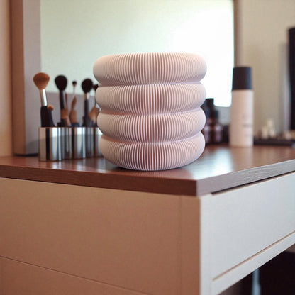 Set of elegant vanity jars in three different sizes, perfect for organizing cosmetics or accessories; available for purchase individually or as a complete set to enhance any bathroom or dressing table decor.