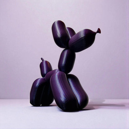 3D-printed figurine resembling a playful dog made from balloons, available in three different sizes. Perfect for home decor, kids' rooms, or as a unique gift for dog lovers.