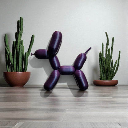 3D-printed figurine resembling a playful dog made from balloons, available in three different sizes. Perfect for home decor, kids' rooms, or as a unique gift for dog lovers.