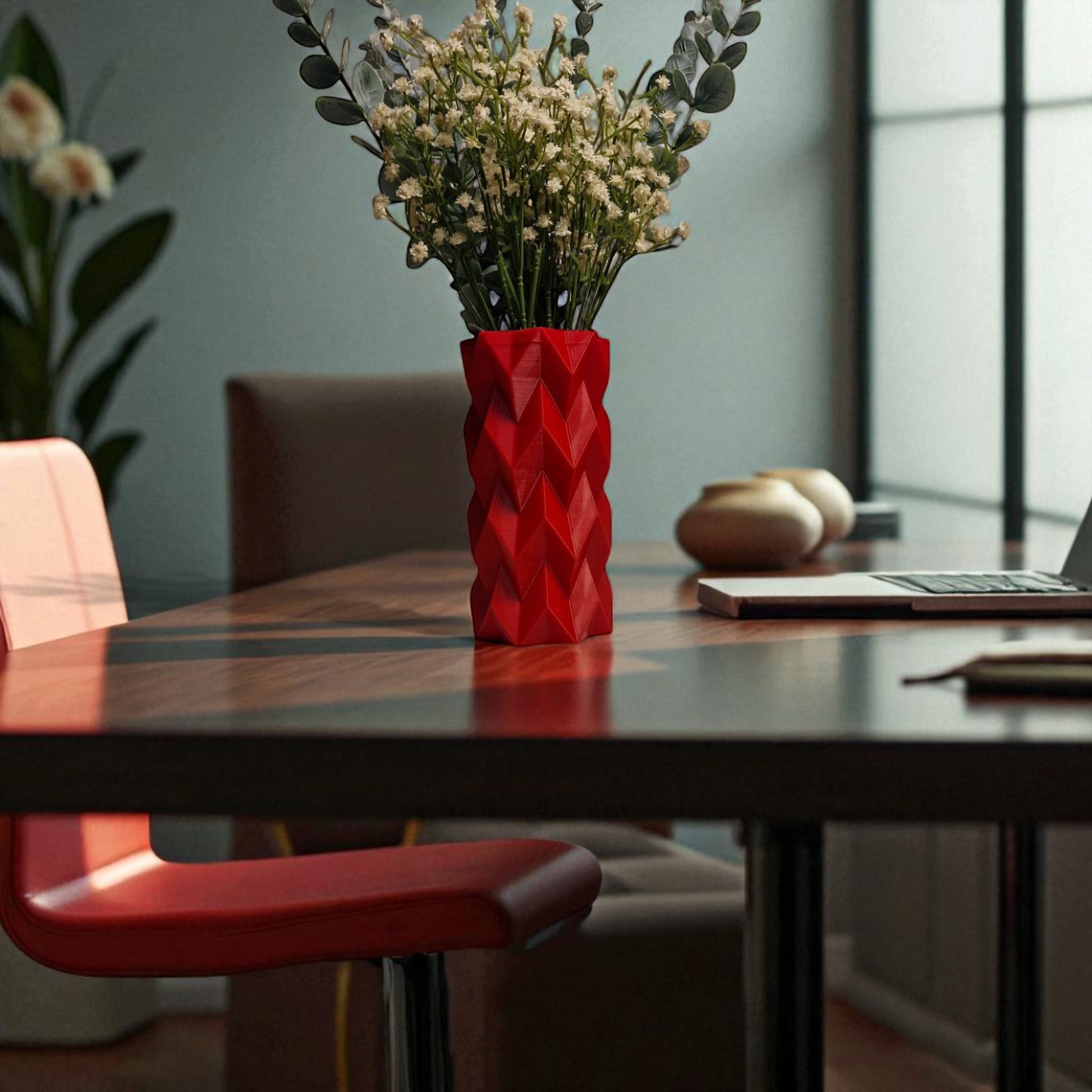 A modern 3D-printed vase with a sleek, sculptural design. Made from durable, waterproof material, this stylish vase is perfect for fresh flowers, dried arrangements, or as a standalone decor piece. Ideal for contemporary and minimalist interiors.