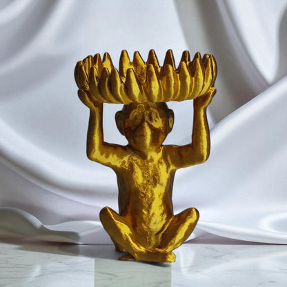 A charming monkey statue designed with a playful and detailed aesthetic, featuring a bowl atop its head shaped like a banana, perfect for holding fruit, candies, or small items, adding a whimsical touch to your home decor