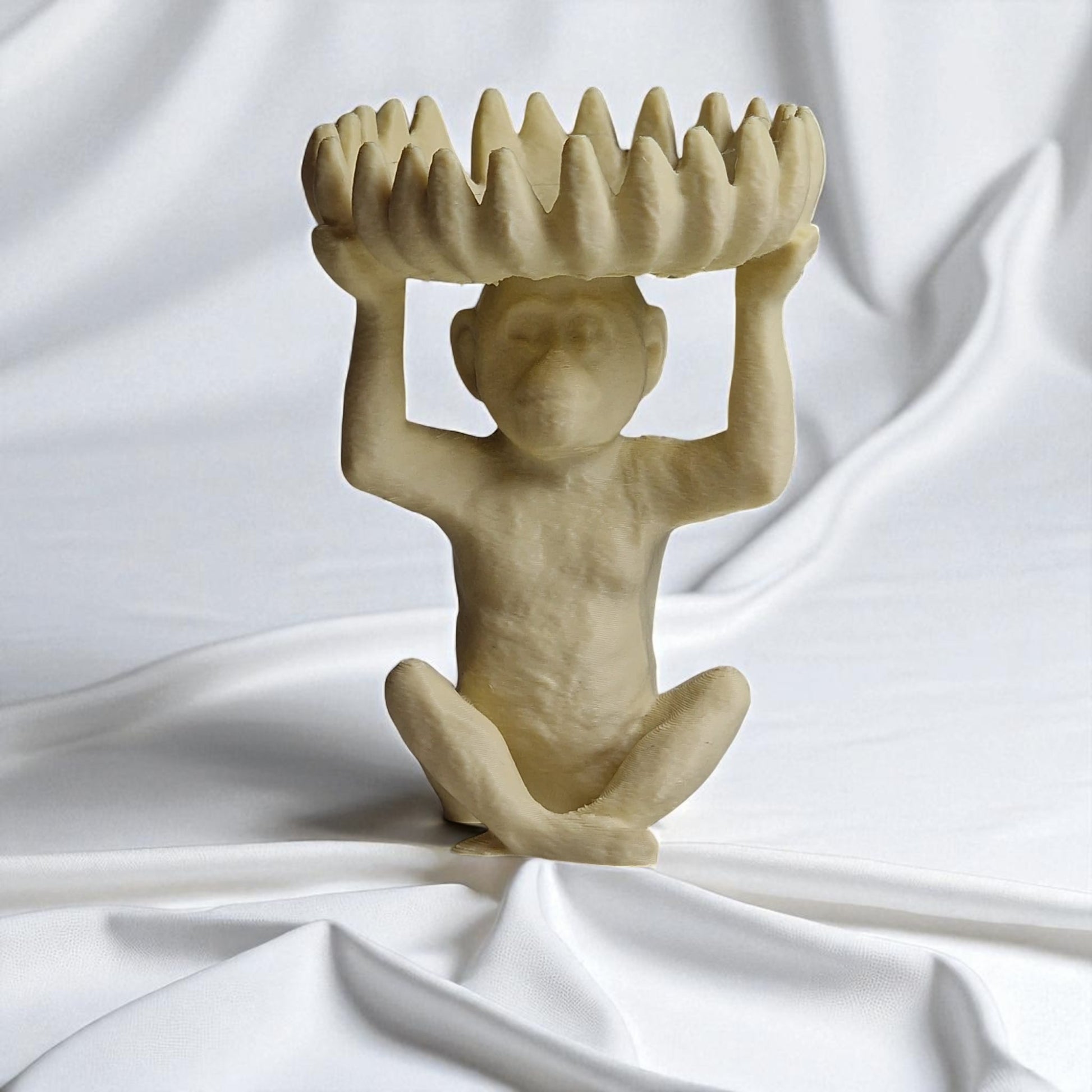 A charming monkey statue designed with a playful and detailed aesthetic, featuring a bowl atop its head shaped like a banana, perfect for holding fruit, candies, or small items, adding a whimsical touch to your home decor