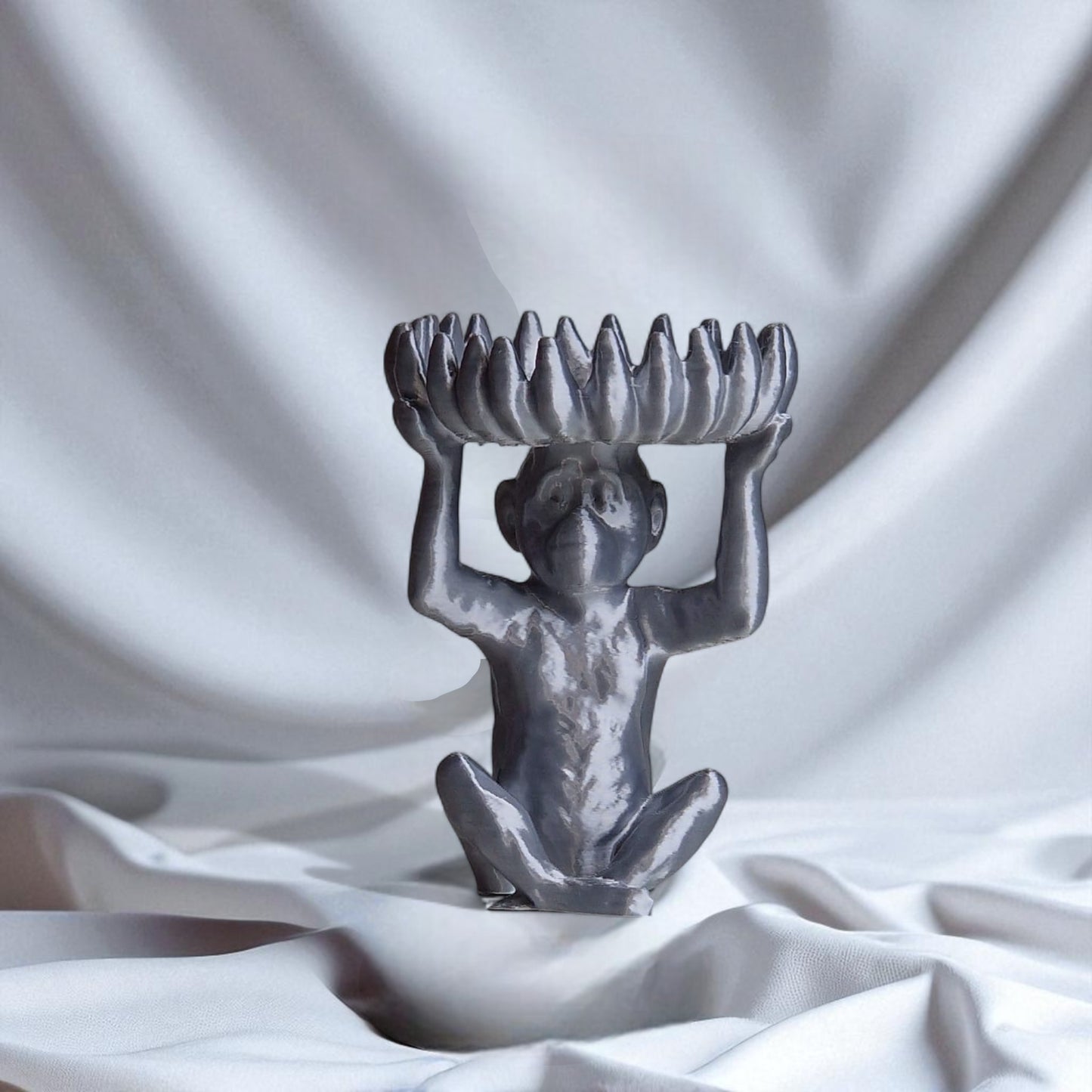 a charming monkey statue designed with a playful and detailed aesthetic, featuring a bowl atop its head shaped like a banana, perfect for holding fruit, candies, or small items, adding a whimsical touch to your home decor